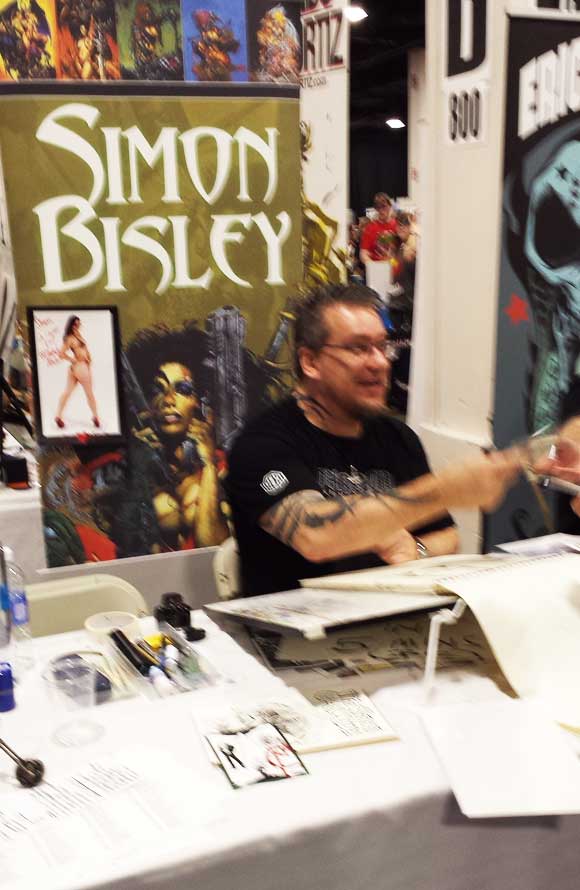 The Mighty Simon Bisley make art and making fans happy.